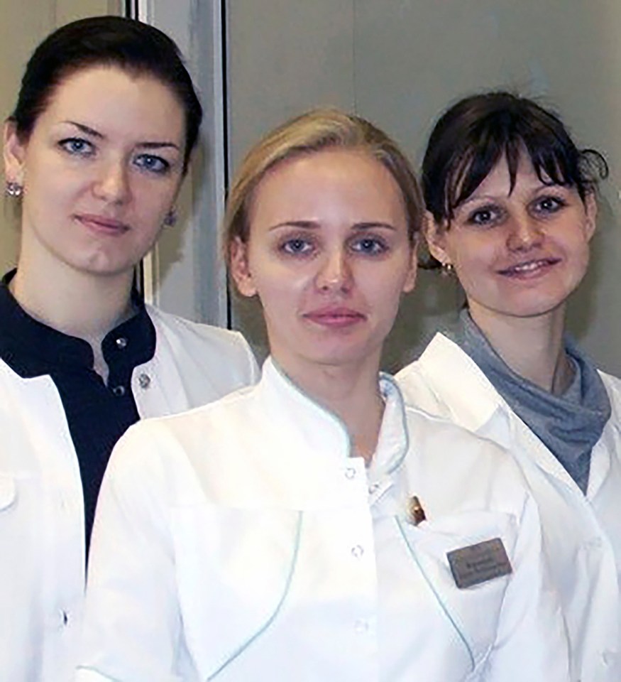 Maria, 35, centre, now has a career in medical research