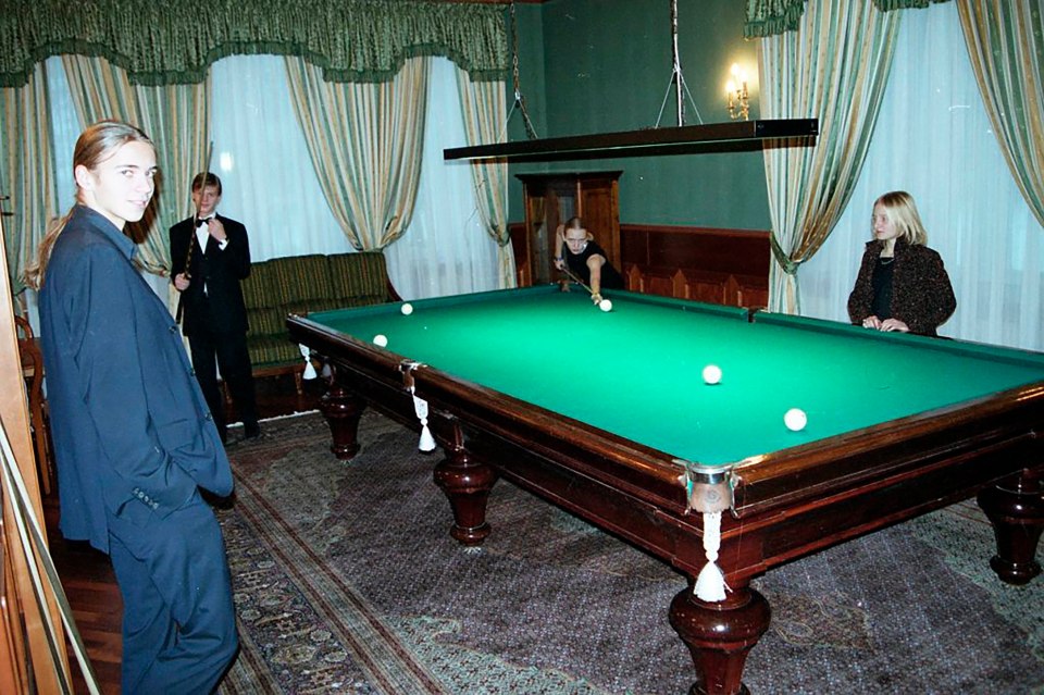 The two seen playing snooker with Pugachev sons Viktor and Alexander