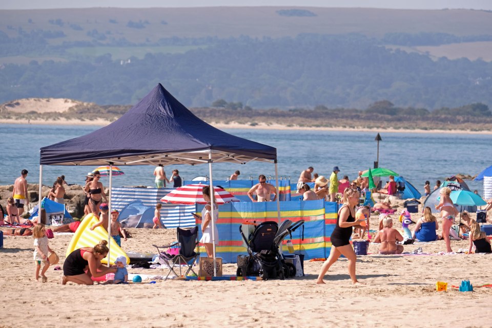  Crowds gather at Branksome beach