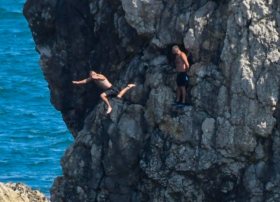  Men jump off cliffs in Durdle Door - which has now been closed off due to safety concerns