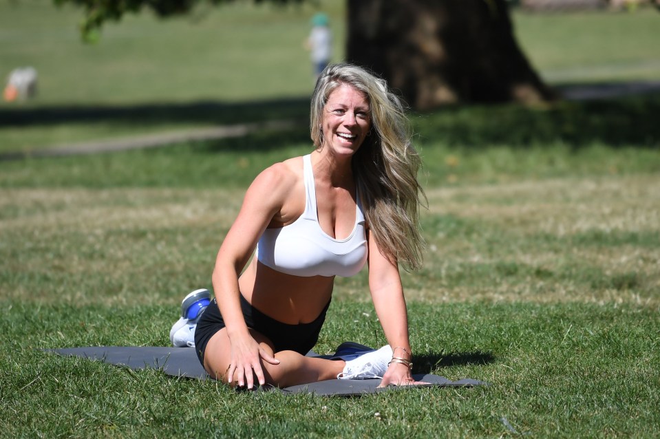 A woman works out at Primrose Hill on Thursday afternoon