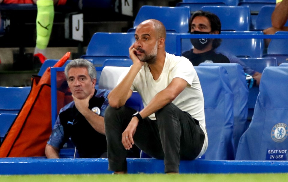  Pep Guardiola watches on frustrated as Man City lose to Chelsea