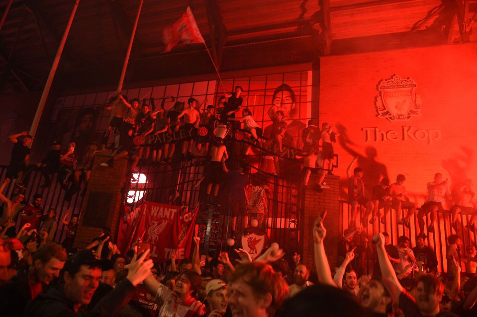 Liverpool fans joyously celebrate their team's title success