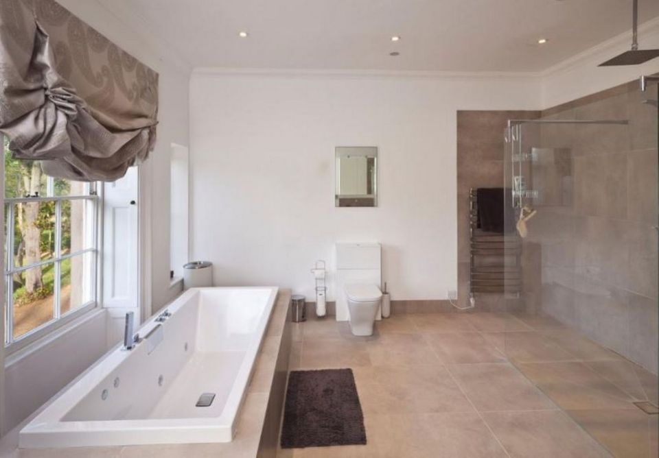 Here the spacious bathroom is seen, and there is also a swimming pool and leisure centre