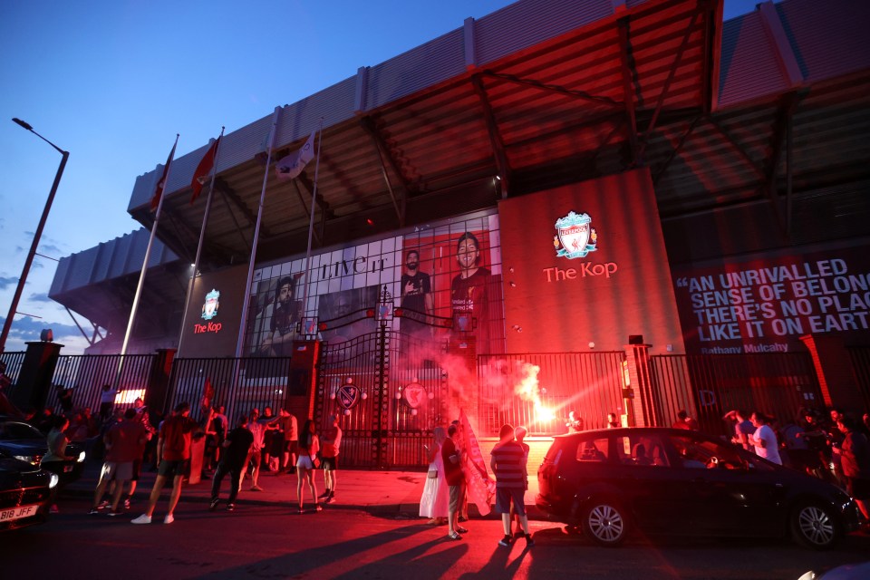  Fans celebrated with flares outside Anfield after Chelsea beat Man City