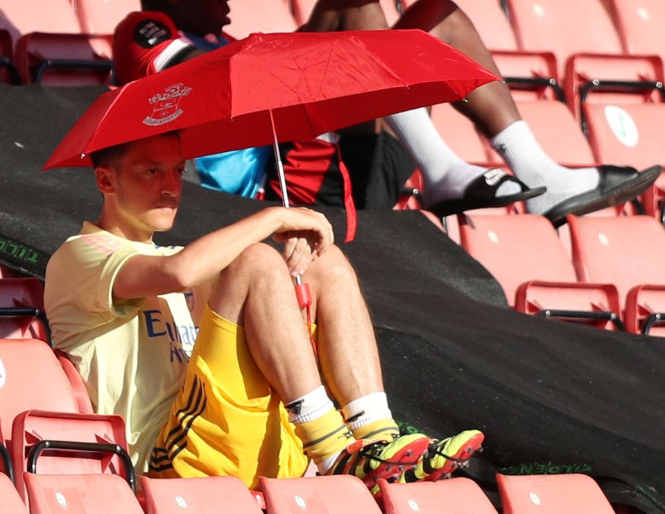  Mesut Ozil was mocked by Arsenal fans for hiding under an umbrella against Southampton