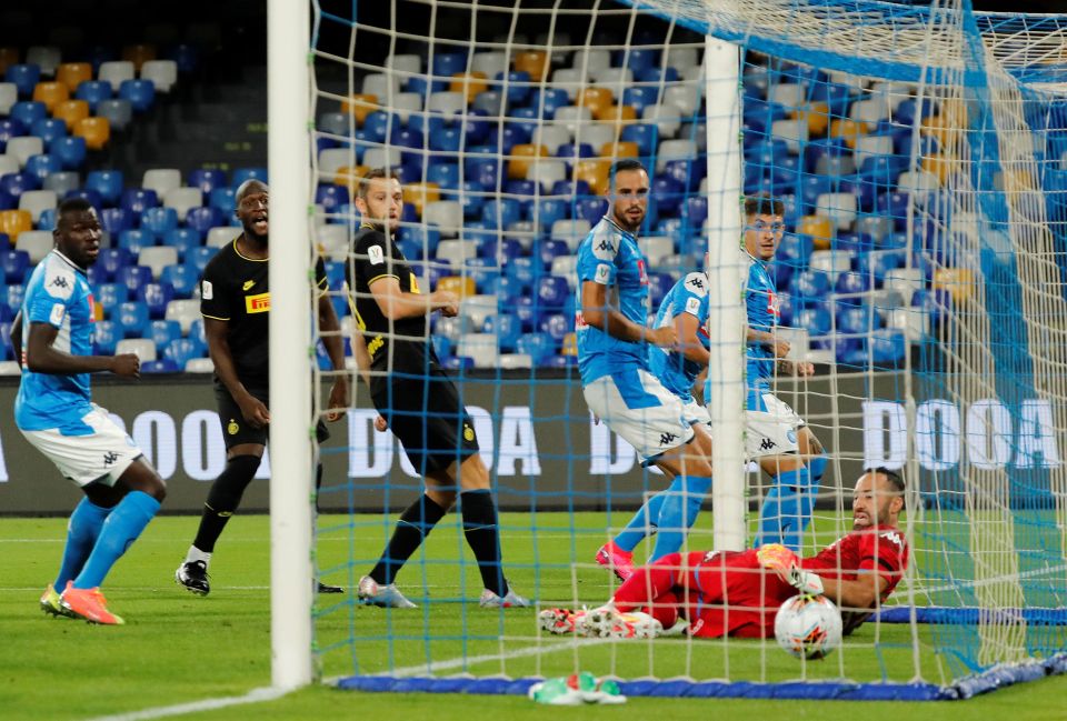  The ball slid under former Arsenal keeper David Ospina