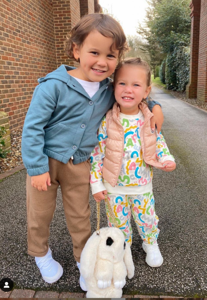 Rosie poses outside the family's Essex home with brother Paul