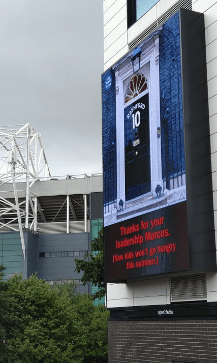  Man Utd fans were loving this mocked-up image near Old Trafford showing Rashford's name on No 10 after he forced the PM into a U-turn on free school meals