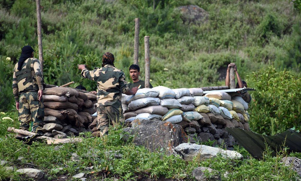 Indian soldiers erect a military bunker following the violent clash on June 16