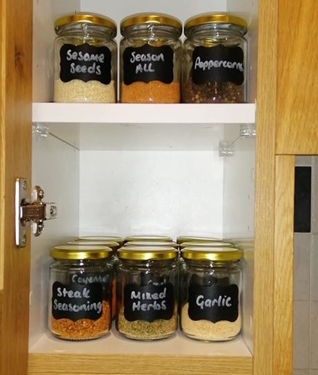 She added labels to all her jars in the cupboards, including some for bay leaves and steak seasoning