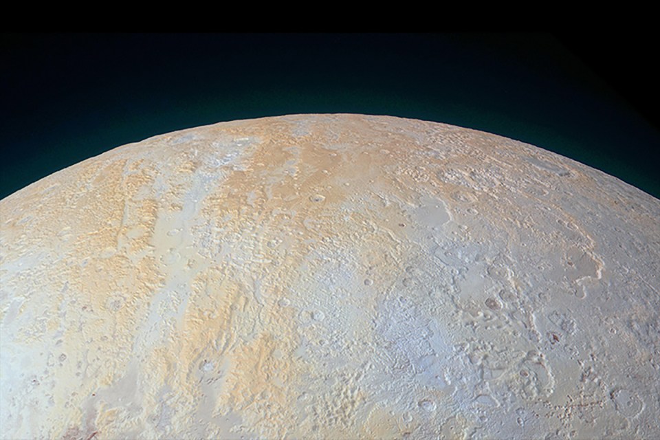 Nasa’s New Horizons spacecraft caught this enhanced-colour image of Pluto’s icy North Pole