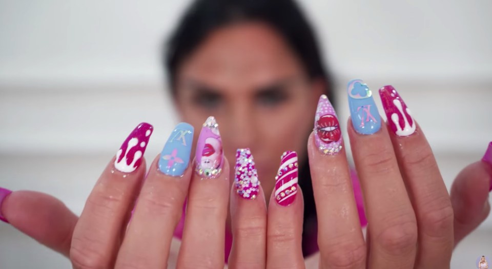 Katie showed off her colourful new nails to fans on YouTube last month