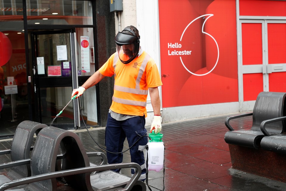 The deserted streets of the city were being disinfected by council workers