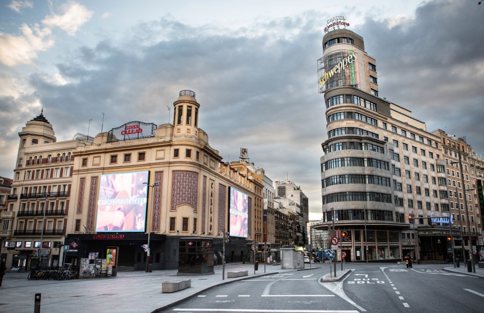 Madrid remains deserted as returning tourists head to beach resorts