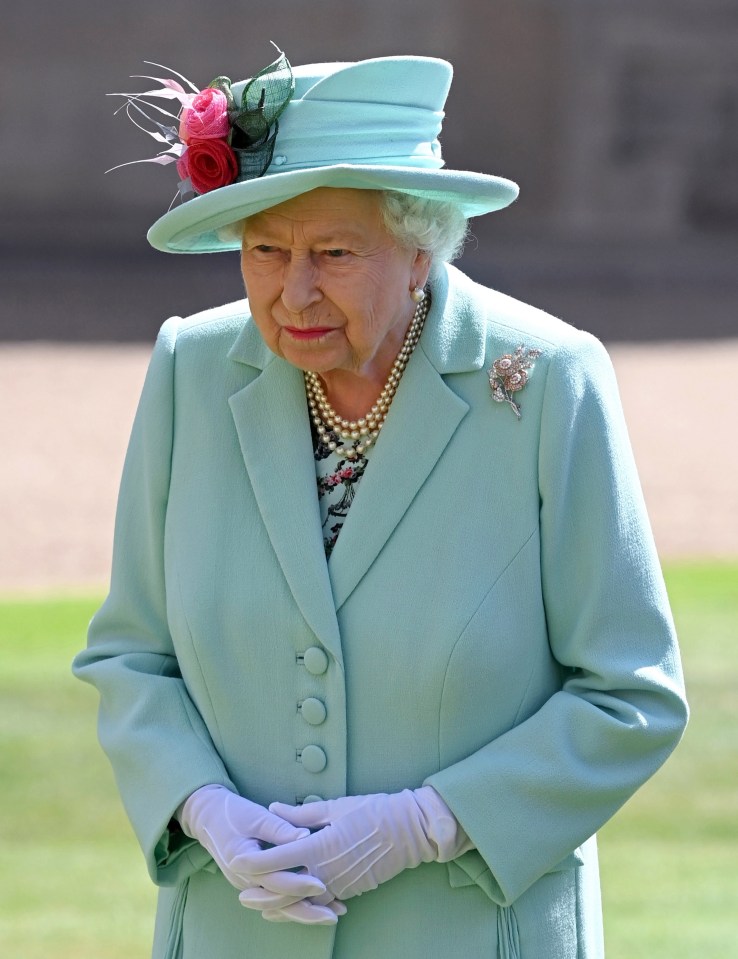 The Queen pictured on Friday morning ahead of knighting Captain Thomas Moore and attending Princess Beatrice's royal wedding