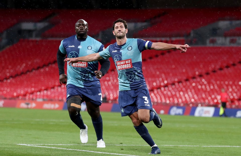 Jacobson celebrates his Wembley winner with team-mate Adebayo Akinfenwa