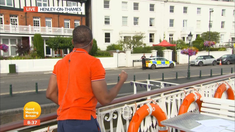 Cheeky Andi shouted over to the cops as they watched him film his Good Morning Britain competition segment