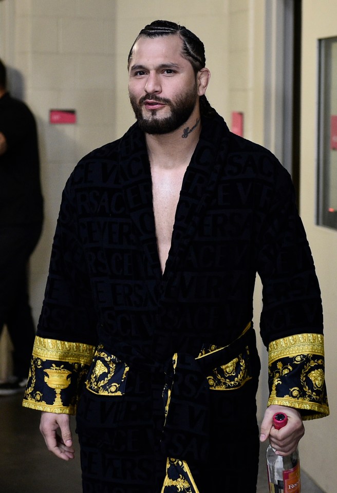 Masvidal arrives backstage during the UFC 246 event wearing a Versace gown