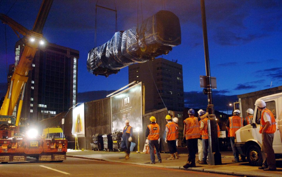  A mangled carriage is lifted from the site of the Edgware Road bomb