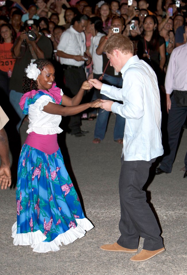 Harry dances in Belize to mark Queen’s 60th- anniversary celebrations in 2012