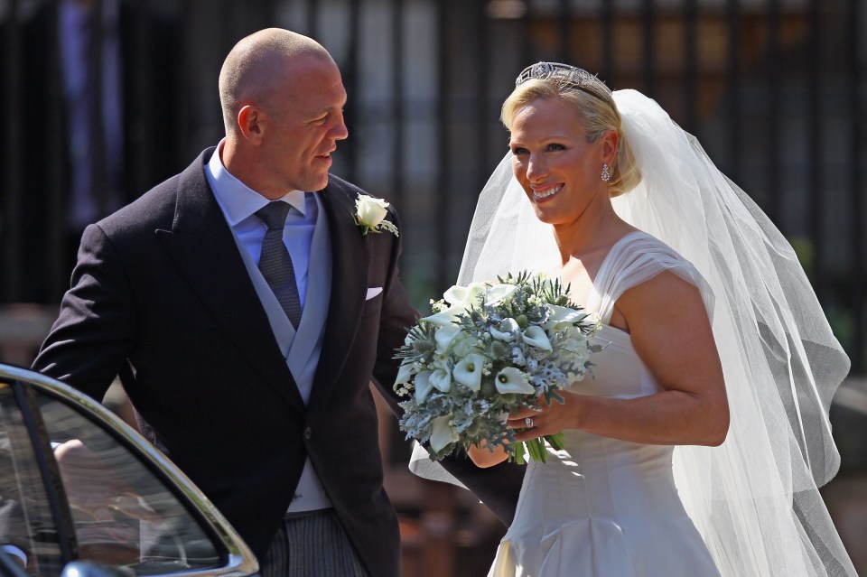 She also wore a fine tulle veil and a diamond tiara was a loan from her mother, Princess Anne