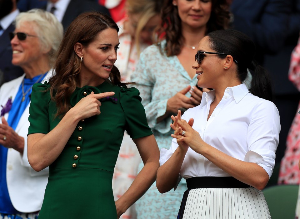 The Duchess of Cambridge and The Duchess of Sussex on day twelve of the Wimbledon Championships last year