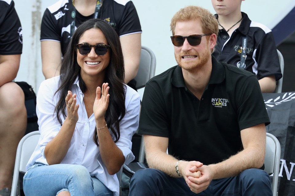 Her shirt could have been a hint at the news the couple were keeping secret