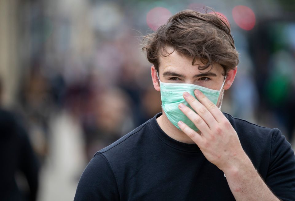 A shopper wears a protective face mask in Edinburgh's Princes Street