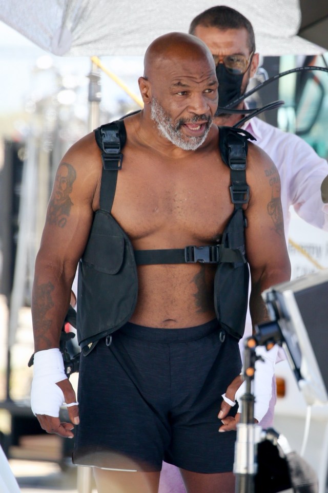 The heavyweight boxing legend, 54, showed off his physique