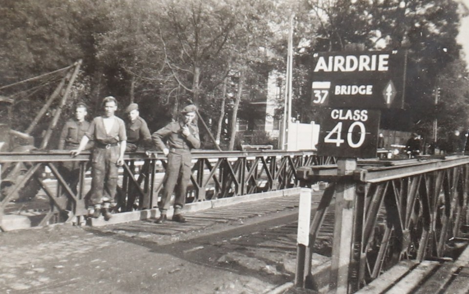 British sappers stand on the 'Success Bridge' in Herenthals, Belgium