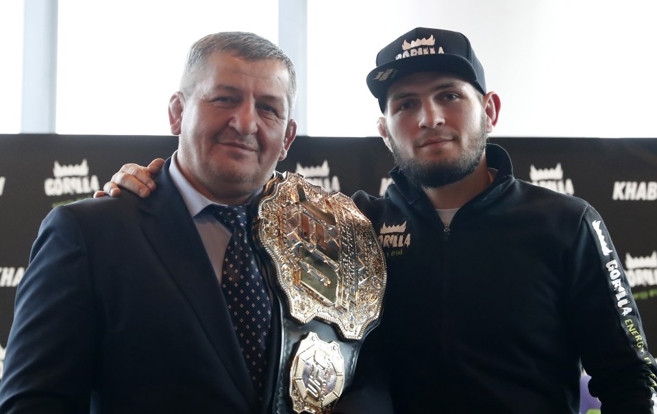 Abdulmanap Nurmagomedov, pictured with his son, passed away aged 57 due to complications related to the coronavirus