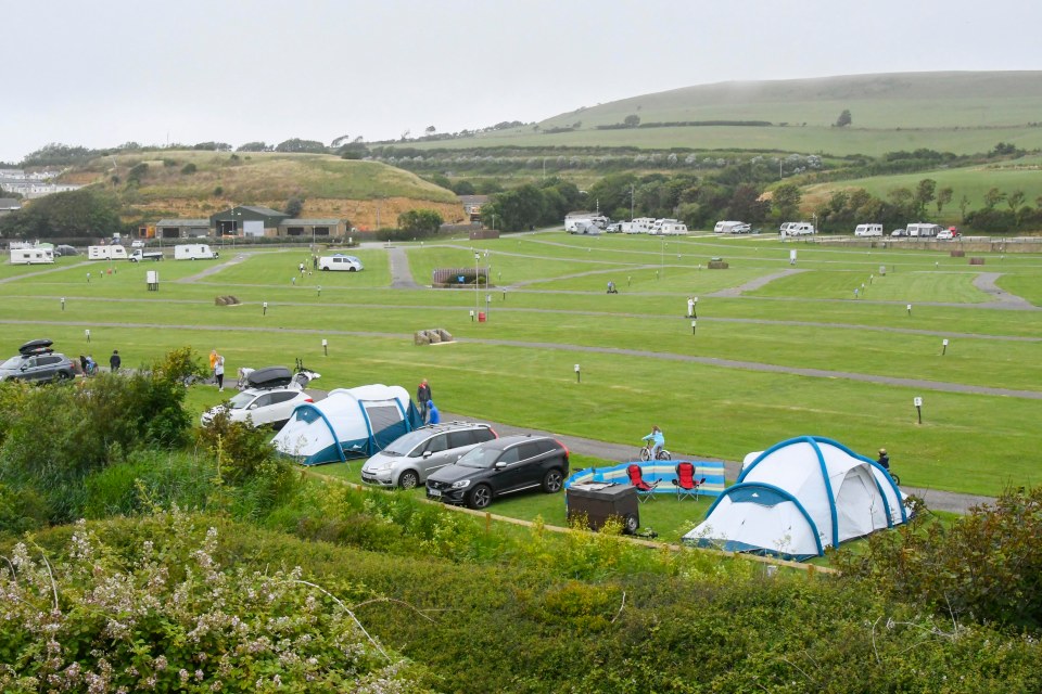 Holidaymakers with caravans, tents and camper vans arrived today at the reopened Freshwater Holiday Park at Burton Bradstock in Dorset