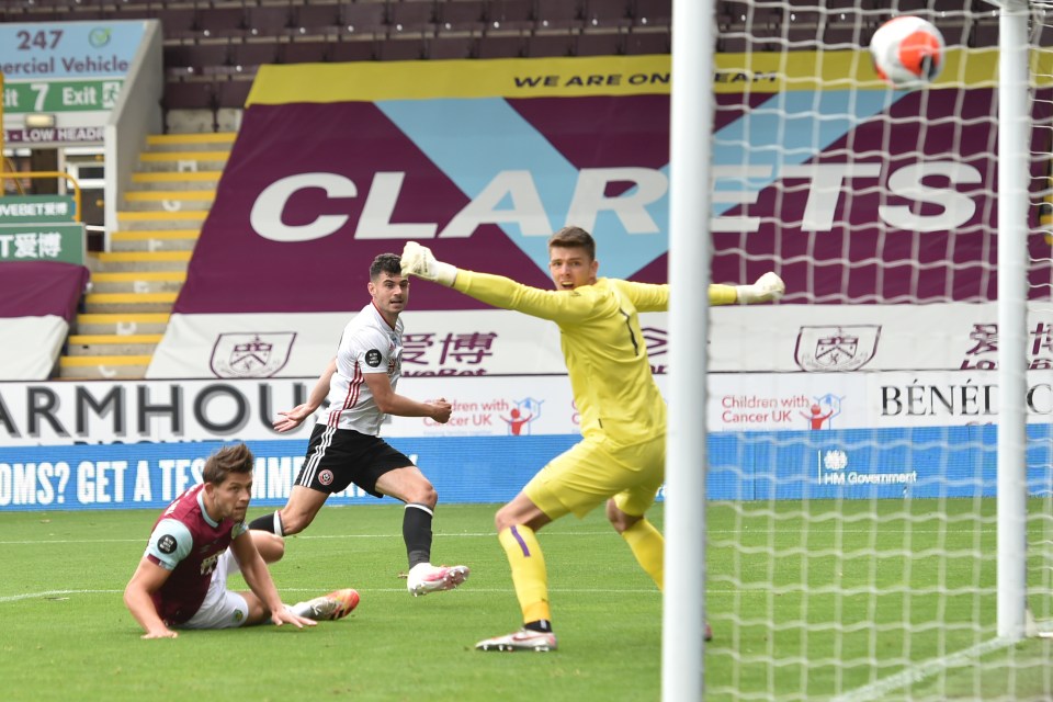 Sheff Utd's John Egan scores past Burnley keeper Nick Pope