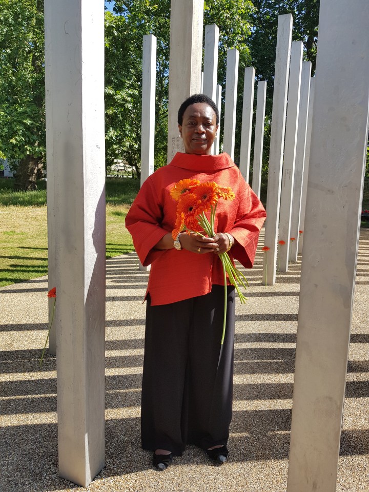  Thelma lays flowers at the Hyde Park Memorial  to remember the 52 who lost their lives