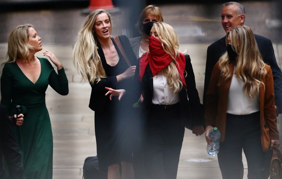 Jennifer Robinson, left, and Heard's sister Whitney, second from the left, are supporting the star