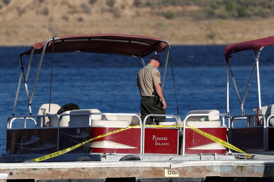 The boat back at the dock with police tape around it