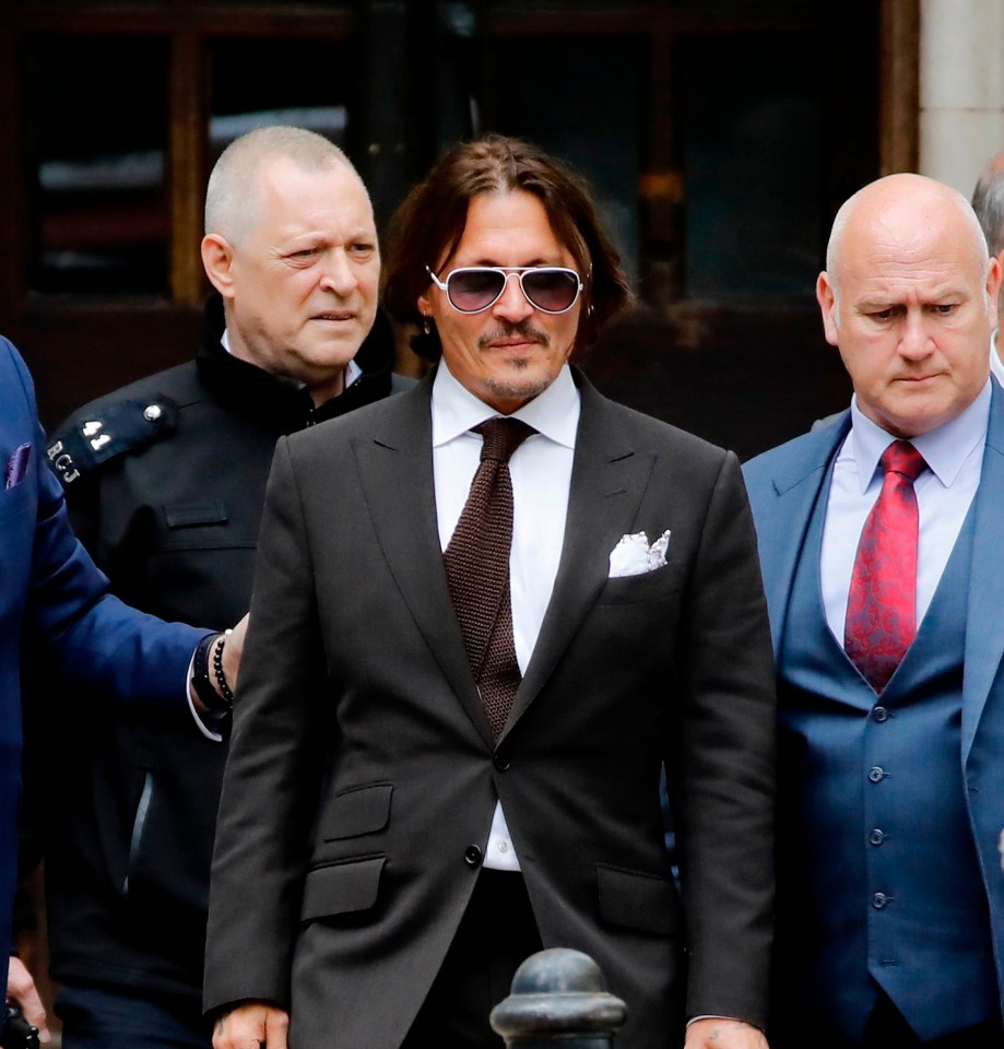 Johnny Depp, pictured leaving court today, told Amber Heard to 'cut' him in audio played to the court