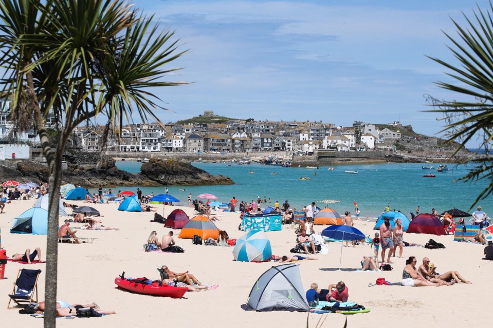 Porthminster Beach, in St Ives, Cornwall, was packed yesterday morning