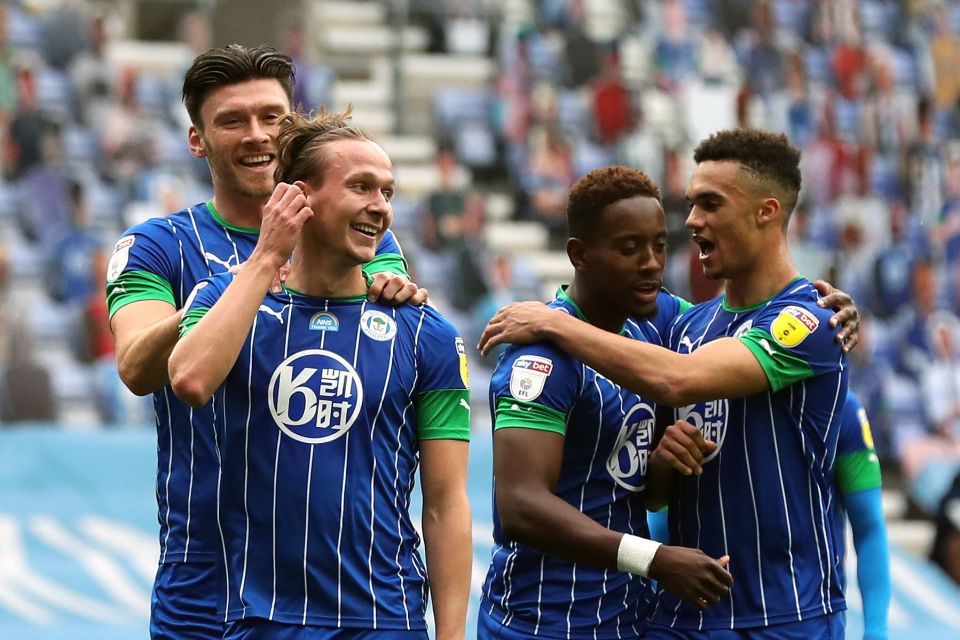 Wigan put seven past Hull inside the first half and went onto win 8-0