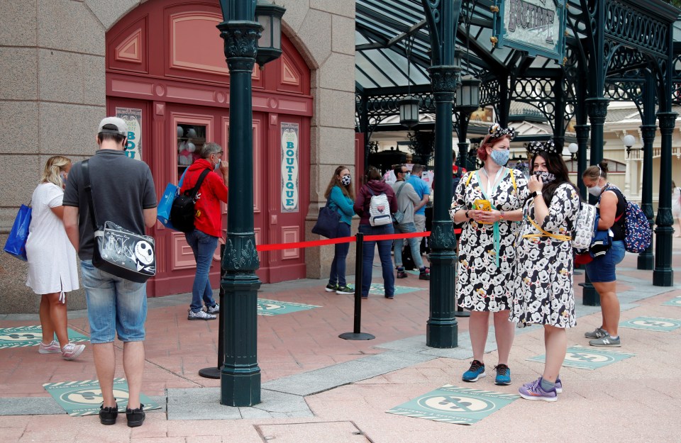 Floor signs are across the park, particularly in areas where queueing is expected