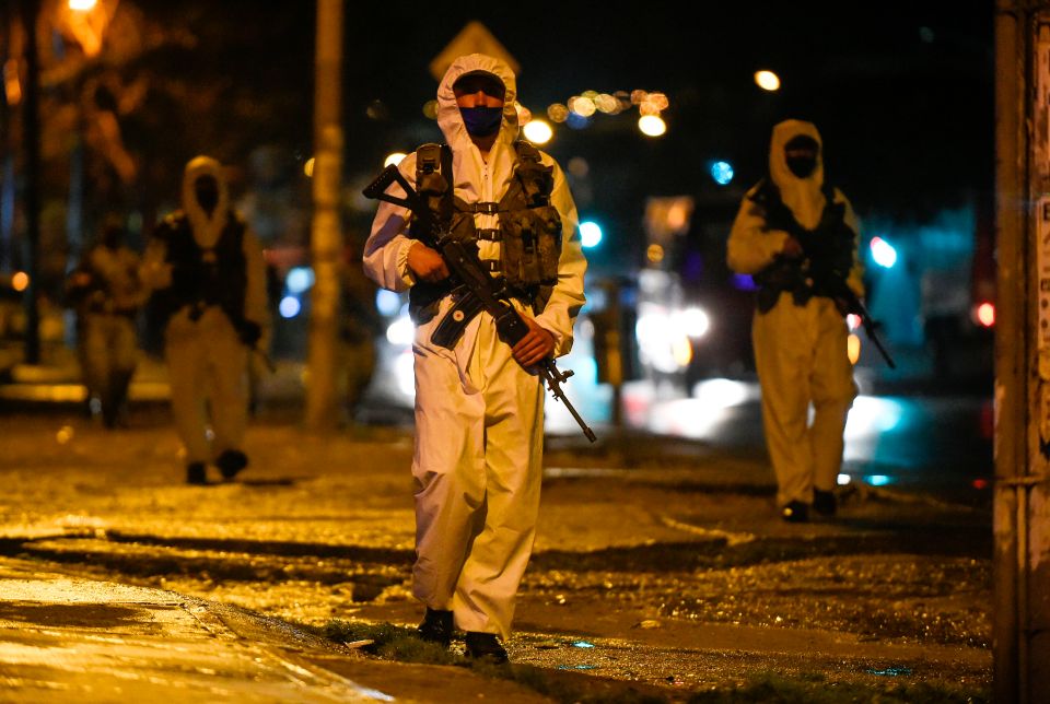 Colombian soldiers patrol the streets of south Bogota