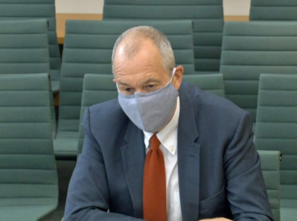 Chief scientific adviser Sir Patrick Vallance was accused of making a point when he ­arrived in a face mask to address a Commons committee