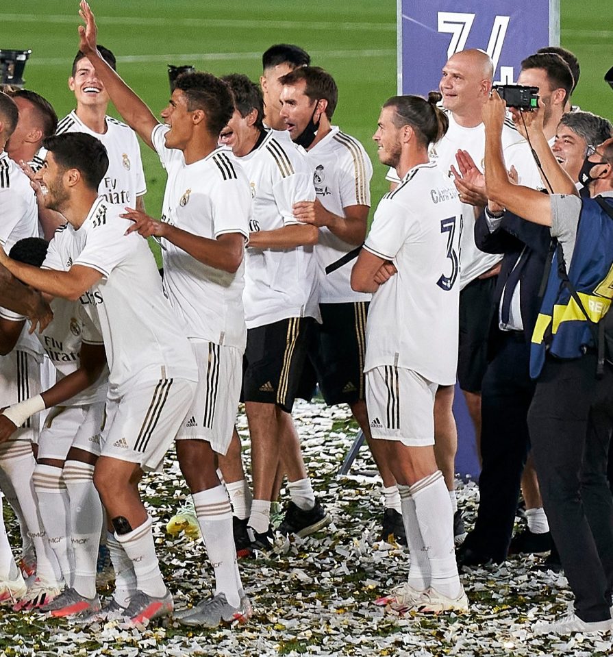 Bale cut a strange figure while the rest of the Real Madrid celebrated their title win