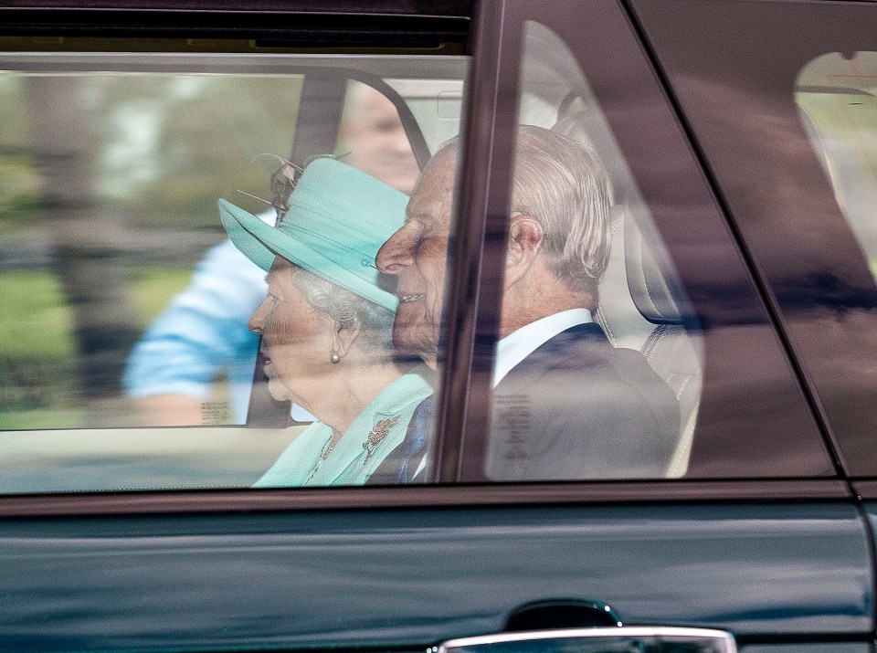 The Queen and Prince Philip being driven on the Long Walk to the Royal Lodge for granddaughter Beatrice's wedding