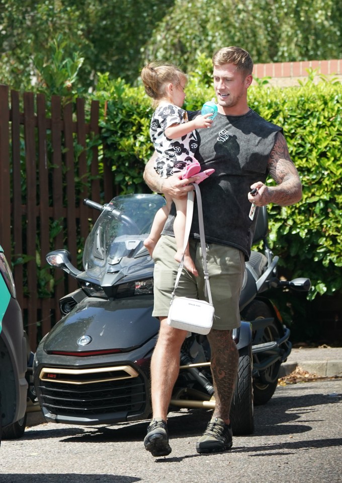 He made sure his daughter was settled before heading for a ride