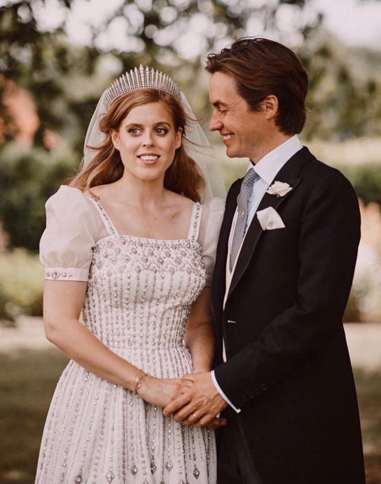 Beatrice wore a vintage ivory gown made from Peau De Soie taffeta that was designed by Norman Hartnell for her wedding this weekend