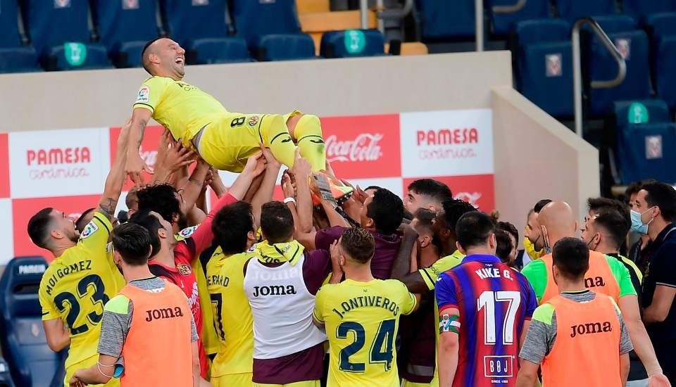 Villarreal players threw Cazorla in the air after his final game for the club