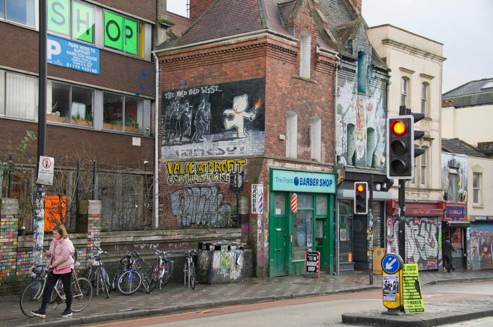 The Mild Mild West shows police officers with riot shields and a teddy bear with a petrol bomb