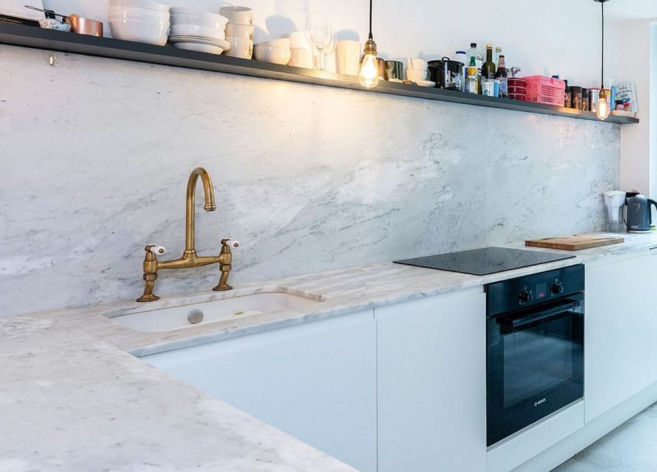 The £700,000 home boast of marble counter tops in the kitchen